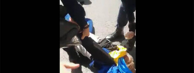 Полиция силой выгнала украинского сторонника с русского марша в Мадриде